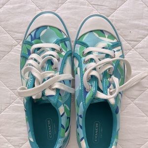 Low top sneakers in combinations of green, light & dark blue with white.